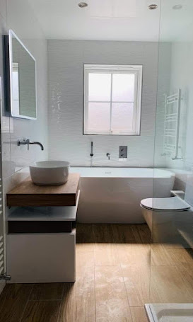 Bathroom with twin mirrors and vessel basins
